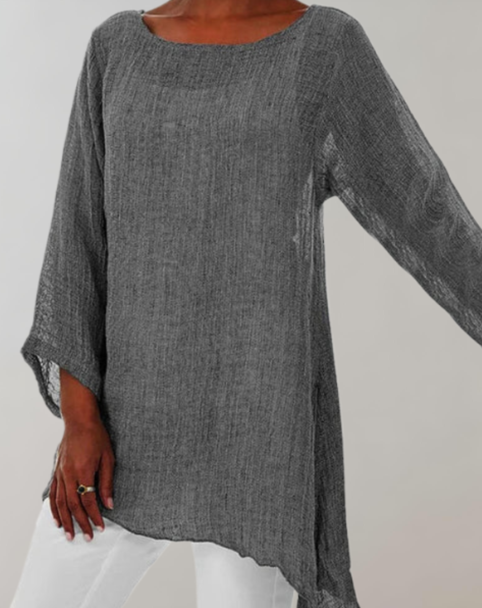 Aaliyah - losvallende oversized top met lange mouwen, ronde hals en asymmetrisch detail