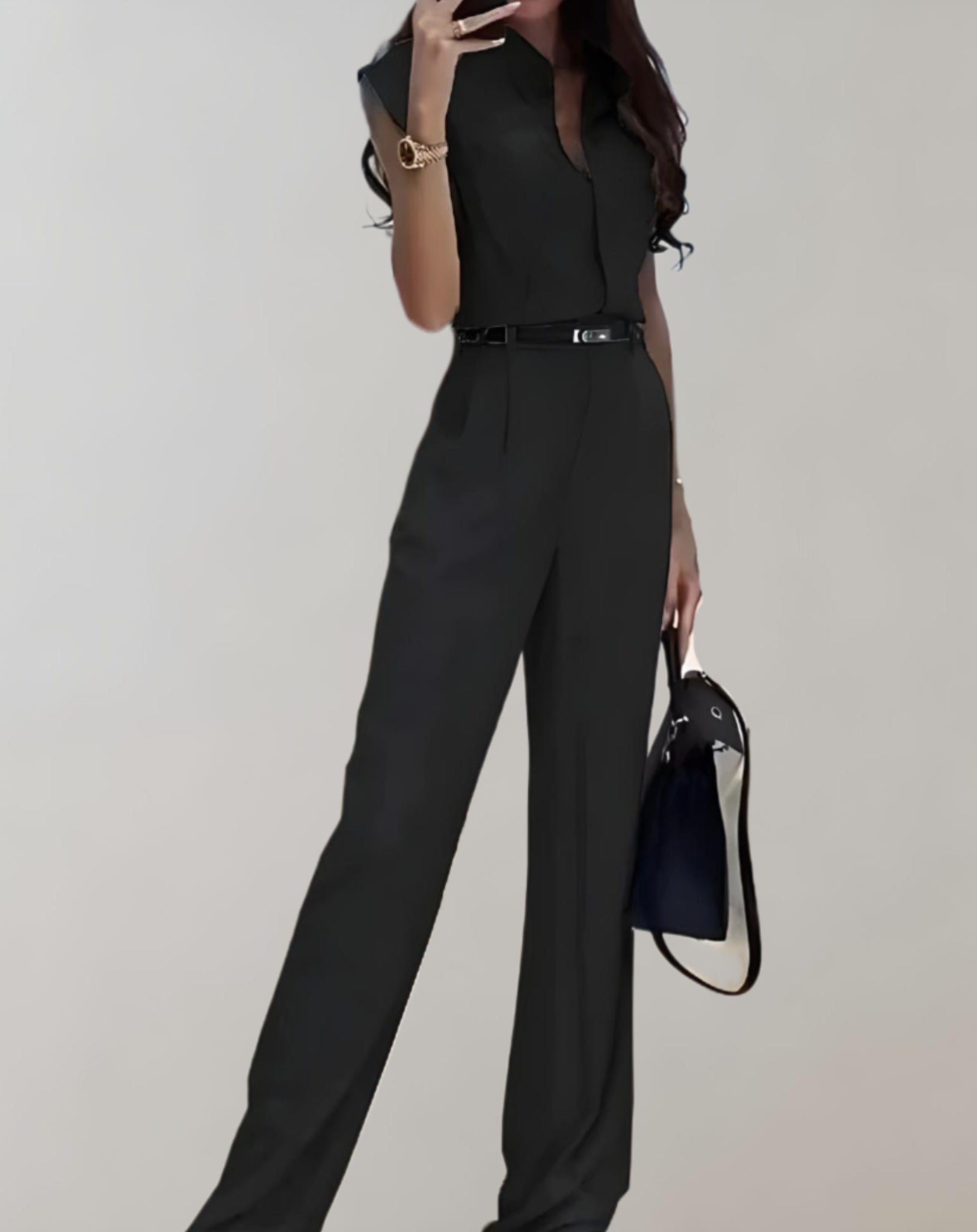 Trina - mouwloze jumpsuit met riem, knopen en broek met wijde pijpen