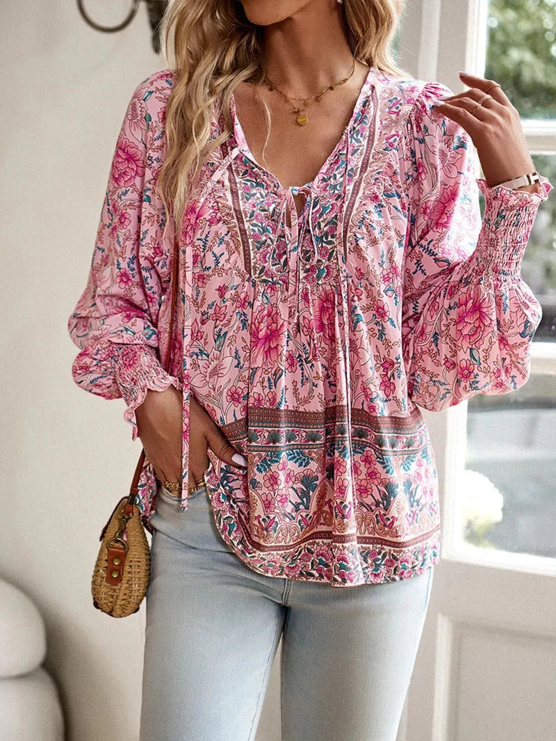 Elegant bluse med blomster