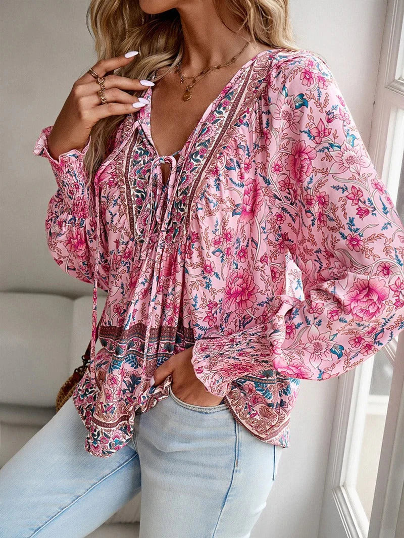 Elegant bluse med blomster