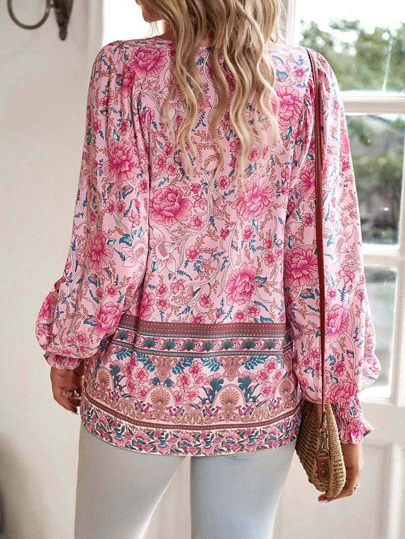 Elegant bluse med blomster