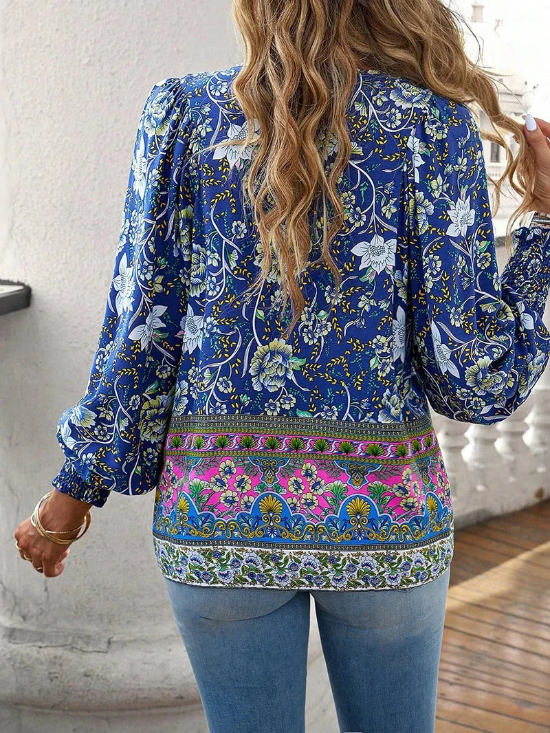 Elegant bluse med blomster